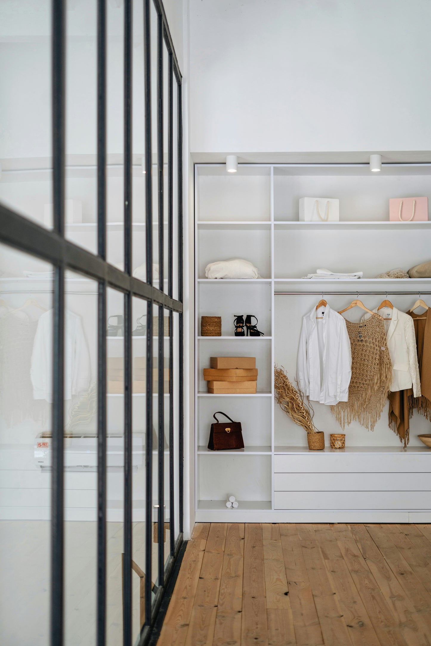 Wardrobe with neatly organised clothes